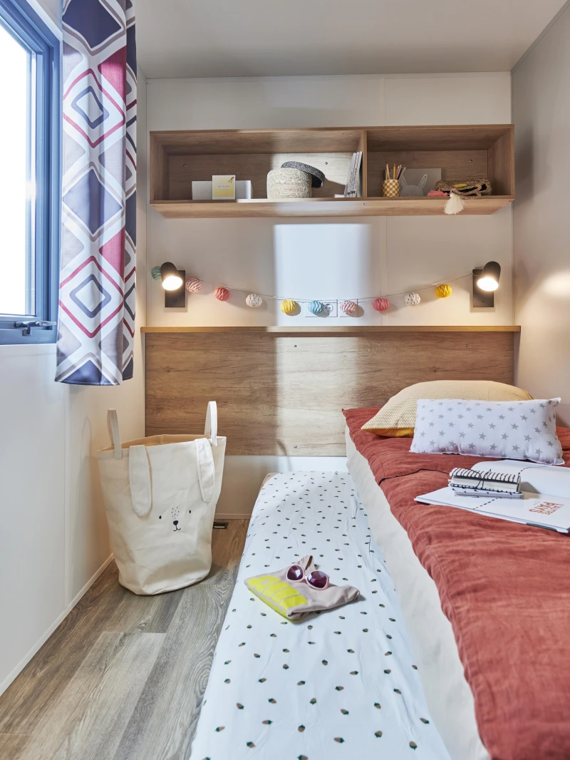 Chambre enfants équipée de lits gigognes
